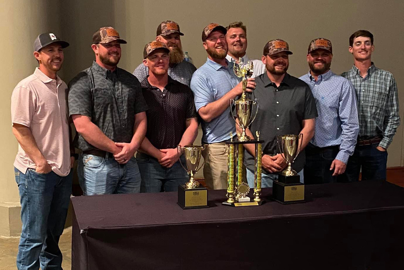 Huntsville Utilities Lineworker Rodeo Team posing with their trophies. 