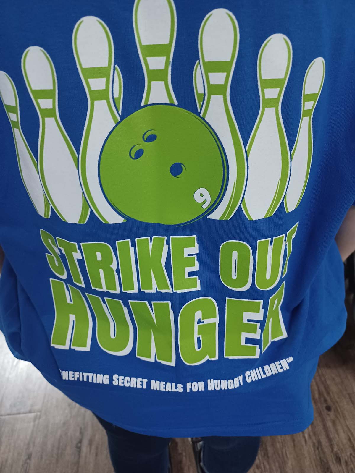 Strike Out Hunger T-Shirt logo